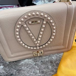 Valentino pebbled leather shoulder bag.